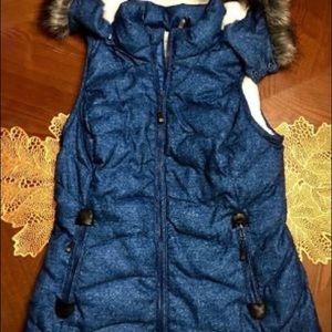 NWOT Soft and plush blue vest. Size S. Never worn!